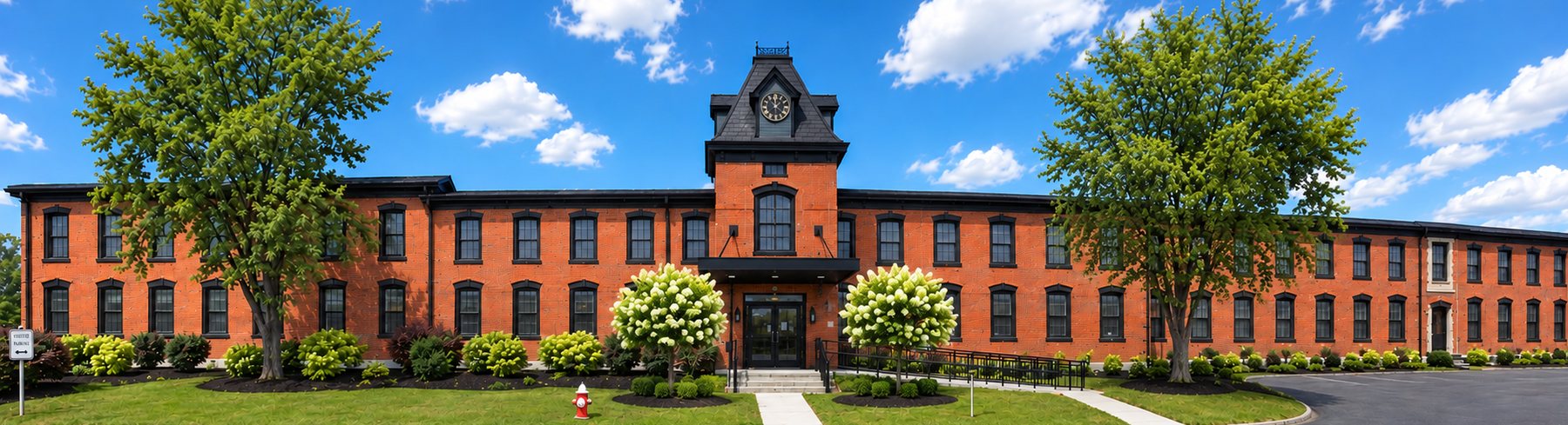 Rendering of Franklin Landings mill building with black trim against red brick